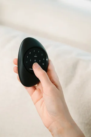 A remote control used to control the shades automatically.